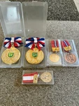 8 Pcs Medal Set With Ribbons, Plastic Cases, Child's Soccer & Marathon. Fixed Price $174.59.
