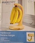 Mainstays Home Hatdwood Banana Hanger. Fixed Price $14.99.
