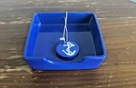 2009 Ceramic Nautical Coastal Blue Napkin Holder Anchor Weight Dennis East. Fixed Price $19.99.