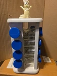 Pillsbury Doughboy Poppin'fresh Swivel Spice Rack 16 Jars. Fixed Price $75.00.