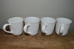 Gibson White Coffee Mugs Swirl Embossed Set 4 Tea Cups Dinnerware Kitchen. Fixed Price $14.40.