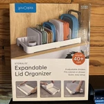 Youcopia Adjustable Pot Lid Holder Standard White Brand New In Box. Fixed Price $12.00.