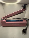 Linsnfield PFS-200 Impulse Sealer Pink 300W 110V Mpn Heat Bag Sealing. Fixed Price $30.00.
