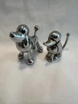 Zinc Metal Chrome Plated Set Of Two Umbra Poodle Dog Figurine Ring Holders. Fixed Price $22.00.