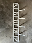White 5-HOOK Wall Mounted Rack. Fixed Price $16.99.