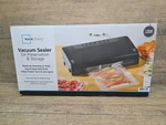 Mainstays Vacuum Heat Sealer Airtight Food Storage New + 10 Roll Built Cutter. Fixed Price $38.00.