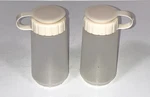 Rubbermaid Oz Salt And Pepper Shakers Set Almond Lid 0479. Fixed Price $10.00.