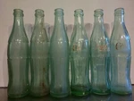 Vintage Coke Bottle Set: Natchez, Tupelo, Winston Salem, Lakeland, Bowling Green. Fixed Price $40.00.