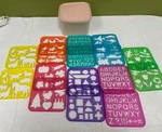 Vtg Tupperware Tuppertoys Stencils & Pink Dusty Rose 11 Cups Container 1620-2. Fixed Price $45.00.