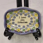 Natural Life 3X2.5 Scalloped Trinket Dish Tea Bag Holder Love You Grandma. Fixed Price $6.97.