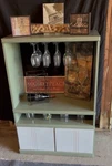 Rustic Wine Bar Cabinet With Hanging Glass Rack. Fixed Price $274.99.