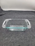 Pyrex C-213 / 1.4L Clear Glass 1.5 Qt Loaf Pan Baking Dish With Open Handles. Fixed Price $12.95.