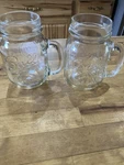 Qty 2 Ball Mason Canning Jar Drinking Mugs With Handle Holds 16 Ounces. Fixed Price $10.00.