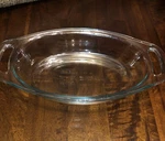 Pyrex Easy Grab #C702 1.3 Qt. Clear Blue Tinted Oval Casserole Dish 10 J60. Fixed Price $25.00.