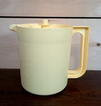 Vintage Tupperware Short Pitcher 1575-6 Push Button Lid Retro Pale Yellow. Fixed Price $12.00.