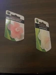 4 Charles Viancin Silicone Bottle Stoppers Cherry Blossom 2 Pink And White. Fixed Price $8.49.