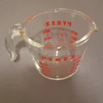 Pyrex Glass Measuring Cup 250ML Clear With Markings Handle Pour Spout. Fixed Price $10.99.