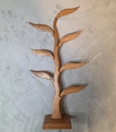 Brown Jempinis Wood Novica Daun Salam Earring Holder Leaf-themed Jewelry Stand. Fixed Price $35.00.