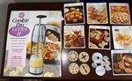 Assort Lot 3: Wilton Cookie Press, 31 Vtg Recipe Cards, And Various Tips. Fixed Price $29.99.