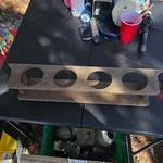 Medium Brown Wood 4-BOTTLE Rectangular Countertop Wine Rack Holder. Fixed Price $25.00.