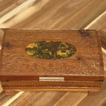 Vintage Carved Wood Trunk Chest Cottage-scene Floral Engraved Footed. Fixed Price $27.75.