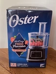 New - Sealed Oster 10 Cup Food Processor 500 Watts Black. Fixed Price $44.99.