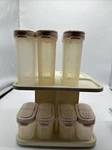 Tupperware Spice Rack Carousel White 3LARGE 4 Small Shakers & Pink Lids. Fixed Price $25.00.