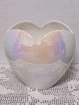 Paris Hilton Iridescent Color Change Heart-shaped 18 Utensil Crock. Fixed Price $24.00.