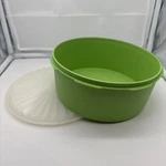 Vintage Tupperware Lime Green Servalier Round Canister With Sunburst Lid 1205-4. Fixed Price $11.00.