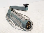 American International AIE-200 Hand Operated Impulse Sealer. Fixed Price $99.99.