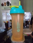 Blenderbottle Classic V2 Orange Green 28OZ Protein Shaker With Loop Top. Fixed Price $13.50.